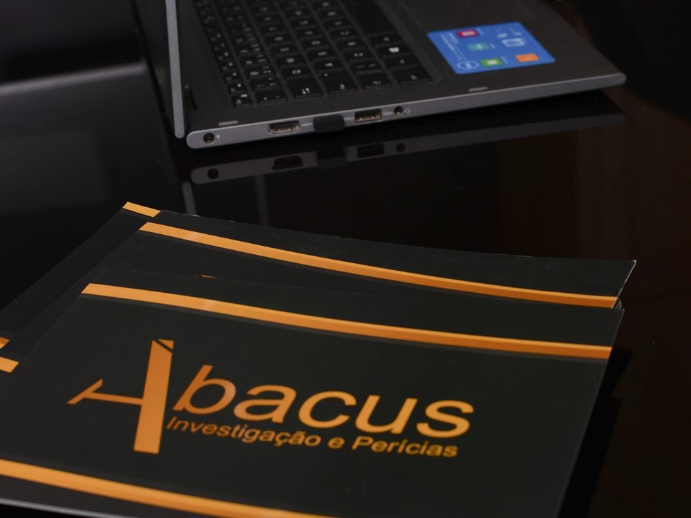 Notebook e portfólio da Agência Ábacus
